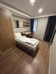 Ένα ή περισσότερα κρεβάτια σε δωμάτιο στο Frezya - Exclusively Woman