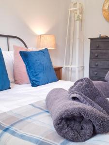 Postel nebo postele na pokoji v ubytování The Moorings + 4 fotografie