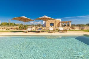 Bazén v ubytování Villa del Cedro nebo v jeho okolí