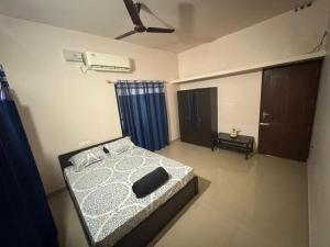 Ένα ή περισσότερα κρεβάτια σε δωμάτιο στο Zenways Retreat - Poovar