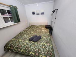 Ένα ή περισσότερα κρεβάτια σε δωμάτιο στο Hooglander rust, Boschaletje +8 φωτογραφίες