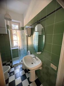 Ένα μπάνιο στο Guest House Foschi Apartment