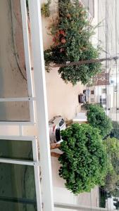 an overhead view of a building with green plants at Résidence OUZA in Dakar