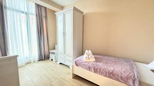 Ένα ή περισσότερα κρεβάτια σε δωμάτιο στο Villas David