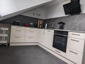 Η κουζίνα ή μικρή κουζίνα στο FeWo zur kleinen Auszeit