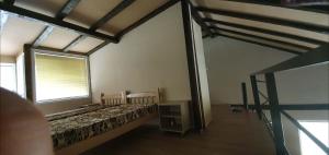 En eller flere senge i et værelse på Svinista vilage + 5 billeder