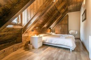 Ένα ή περισσότερα κρεβάτια σε δωμάτιο στο Hotel Nau Iori