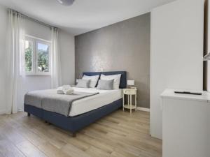 En eller flere senge i et værelse på Luxury sea view villa Biograd + 97 billeder