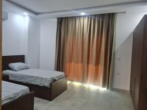 Postel nebo postele na pokoji v ubytování Mirage Bay Resort & Aqua Park