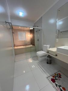 Ванная комната в Ville Charme-praia dos amores, Balneário Camboriú