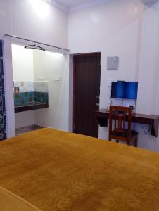 Una televisión o centro de entretenimiento en BYB Boutique Hotel