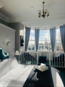 Postel nebo postele na pokoji v ubytování The Ilchester Arms + 2 fotografie