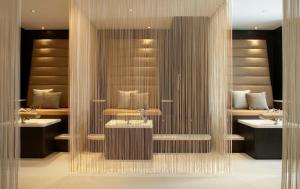 a bathroom with two sinks and two sinksktop at The Europe Hotel & Resort in Killarney