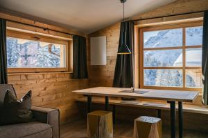 Posezení v ubytování Rotwandwiesen Chalets SKI IN/OUT - 1900mt