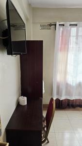 Μια τηλεόραση ή/και κέντρο ψυχαγωγίας στο Loiusiana City Hotel