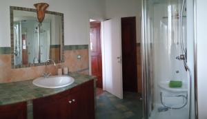 a bathroom with a sink and a shower at B&B La poeta in Campofilone +36 photos