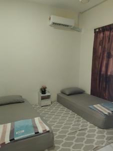 Posezení v ubytování D' Farm Homestay