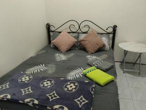 Postel nebo postele na pokoji v ubytování D' Farm Homestay