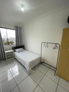 Postel nebo postele na pokoji v ubytování Apartamento Luzza - 2 quartos