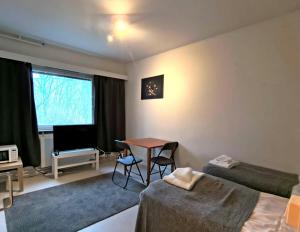 Posezení v ubytování Forenom Serviced Apartments Vihti