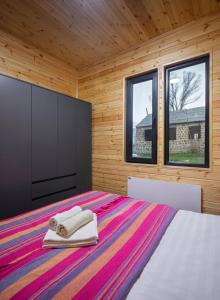 Ένα ή περισσότερα κρεβάτια σε δωμάτιο στο Meronts