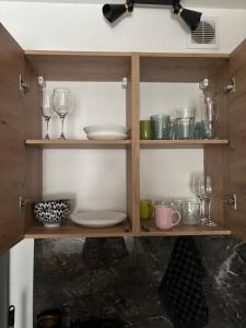 Kuchyň nebo kuchyňský kout v ubytování Cute apartament + 9 fotografií