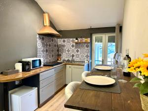 Η κουζίνα ή μικρή κουζίνα στο Suite Reale