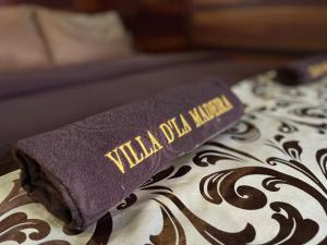 Ένα ή περισσότερα κρεβάτια σε δωμάτιο στο Villa D'La Madeira