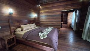 Ένα ή περισσότερα κρεβάτια σε δωμάτιο στο Villa D'La Madeira