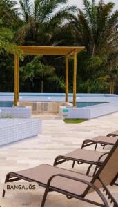 Πισίνα στο ή κοντά στο Apto aconchegante em condomínio resort litoral sul