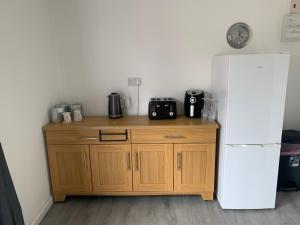 Η κουζίνα ή μικρή κουζίνα στο Sunnyside guest house +7 φωτογραφίες