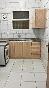 Η κουζίνα ή μικρή κουζίνα στο أللورا زون - Alora Zone