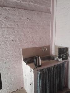 Η κουζίνα ή μικρή κουζίνα στο El Rincón del Capibara Alojamientos