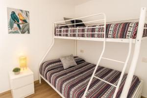 Postel nebo postele na pokoji v ubytování Tu hogar en Sevilla