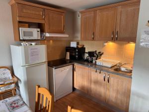 Køkken eller tekøkken på T2 bis duplex 6 couchages situé aux BOTTIERES