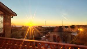 Amanecer o atardecer desde la casa de huéspedes o alrededores