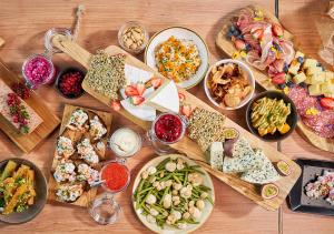 a table full of different types of food on plates at Viking Line ferry Viking XPRS - Night Cruise from Helsinki in Helsinki