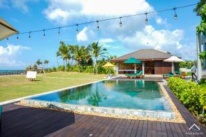 Πισίνα στο ή κοντά στο Six Elements Beach Villa