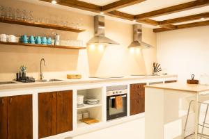 Η κουζίνα ή μικρή κουζίνα στο Bucio Coliving