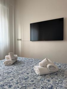 Et tv og/eller underholdning på Re Home Riccione