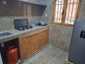 Kuchyň nebo kuchyňský kout v ubytování Fdel TVZ + 13 fotografií