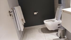 Et badeværelse på City Slick Hideaway + 14 billeder