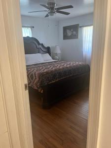 Ένα ή περισσότερα κρεβάτια σε δωμάτιο στο University Area Four Bedroom House