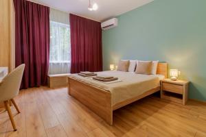 En eller flere senge i et værelse på Апартамент за гости Ирис 2 Iris guest apartment 2
