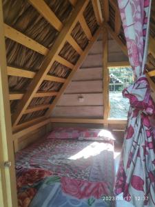 Ένα ή περισσότερα κρεβάτια σε δωμάτιο στο Beyond Brahmaputra & Eagles Nest