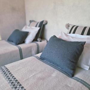 Ένα ή περισσότερα κρεβάτια σε δωμάτιο στο Tempo B&B