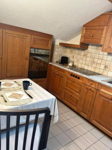 Η κουζίνα ή μικρή κουζίνα στο Ferienwohnung mit Herz