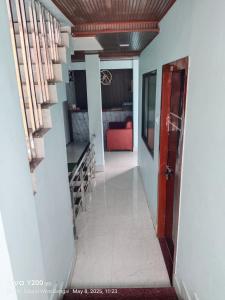 Ένα ή περισσότερα κρεβάτια σε δωμάτιο στο Durga guest house