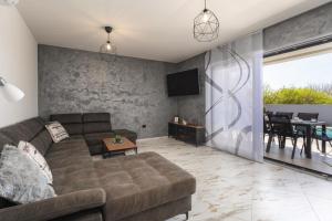 Posezení v ubytování Villa Barbara by Villsy