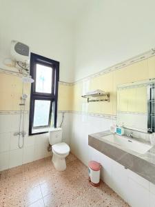 Ένα μπάνιο στο Khách Sạn Đối Ngoại Biên Phòng